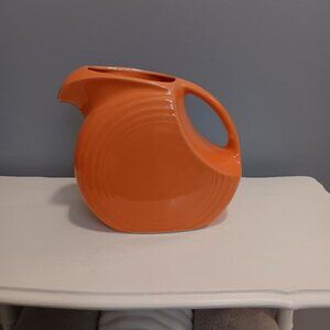 Fiesta Ware Vintage Orange Disk Pitcher 7 1/4"